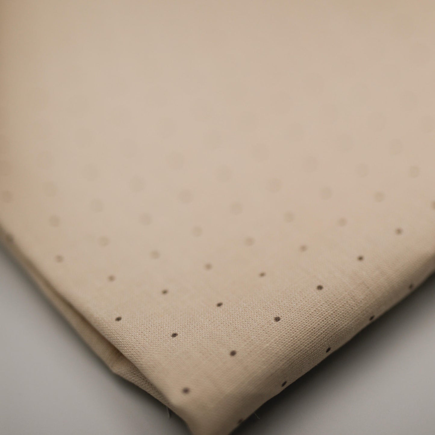 Tiny polka dot on subtle sand 100% linen fabric 004