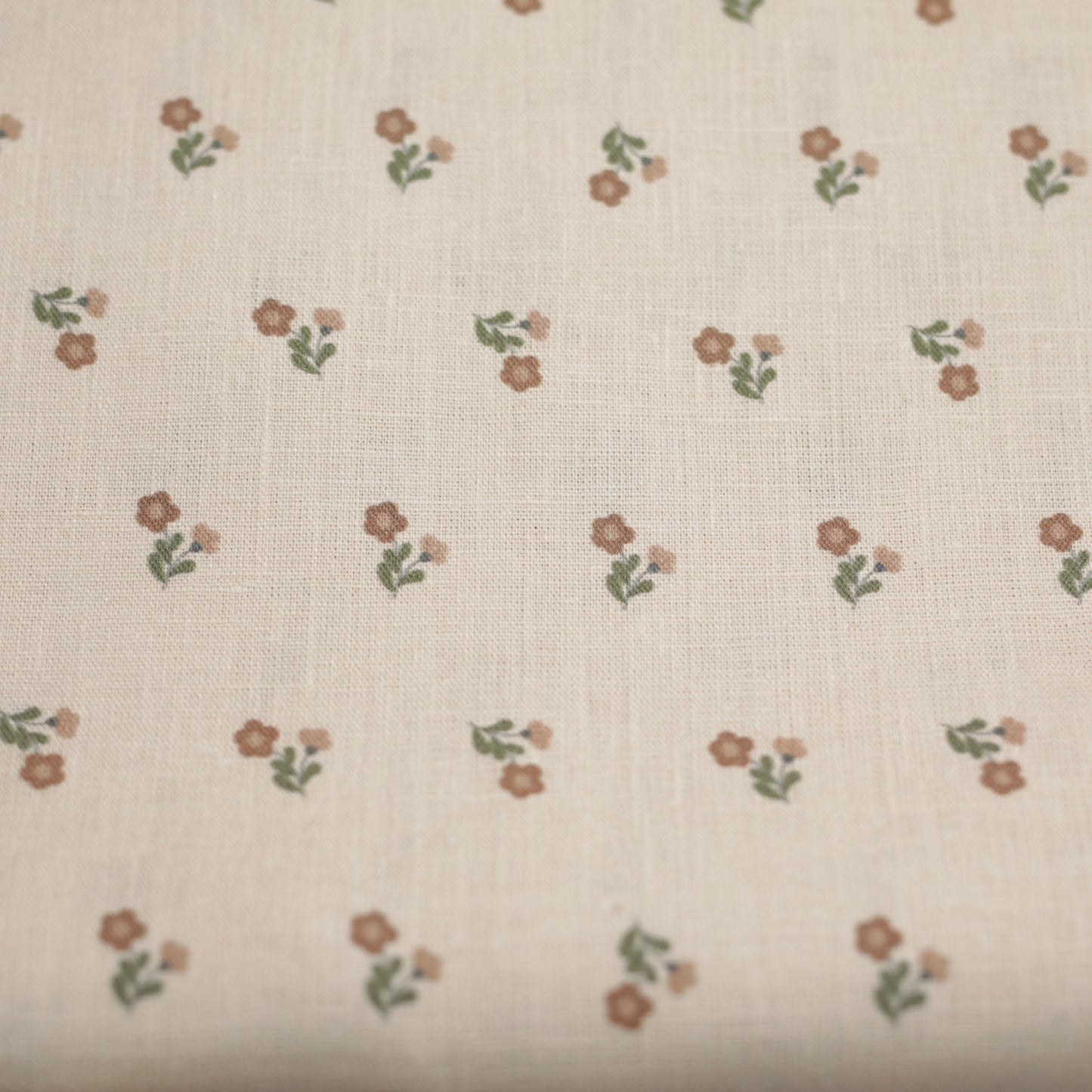 Light peach fuzz 100% linen fabric with flowers